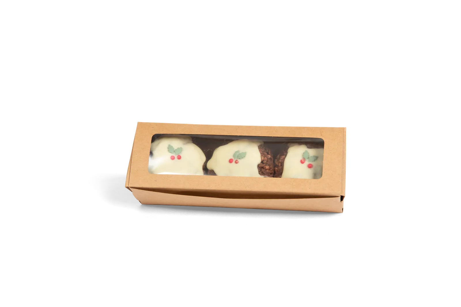 Box of three iced festive bakes decorated with holly